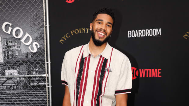 Jayson Tatum wears Travis Scott x Air Jordan 1 sneakers at the NYC Point Gods Premiere at The Midnight Theatre.